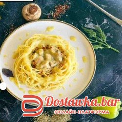 Спагетти в сливочном соусе и грибами