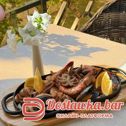 Императорский микс из морепродуктов на сковороде